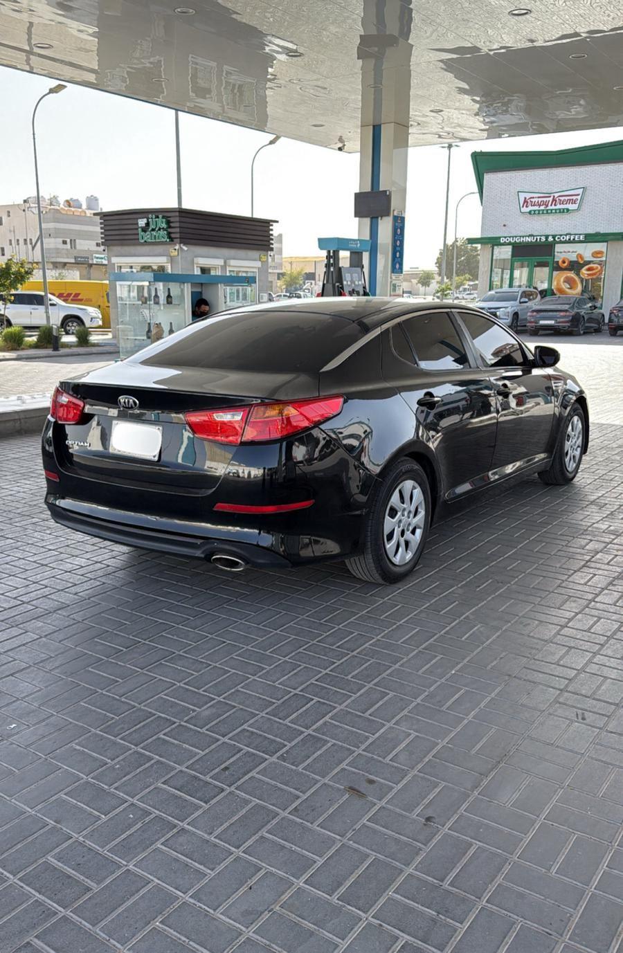 اوبتيما 2015 اسود