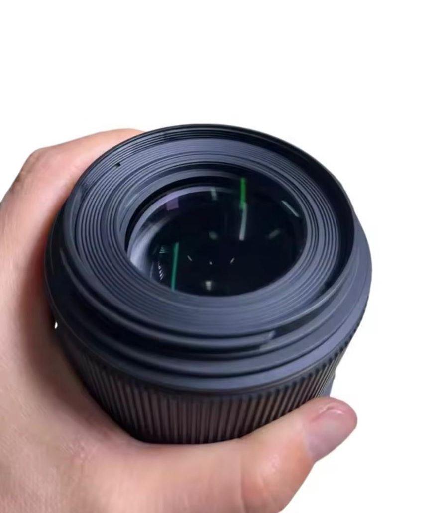 عدسة sigma