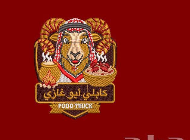 تطريز ملابس عمّال