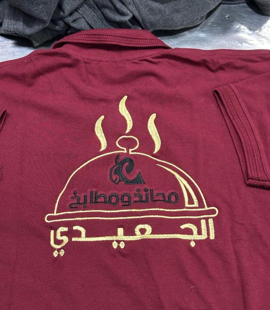 تطريز ملابس عمّال