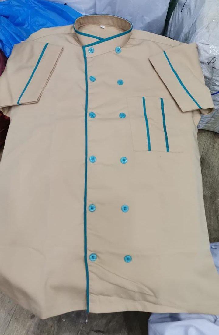 تطريز ملابس عمّال