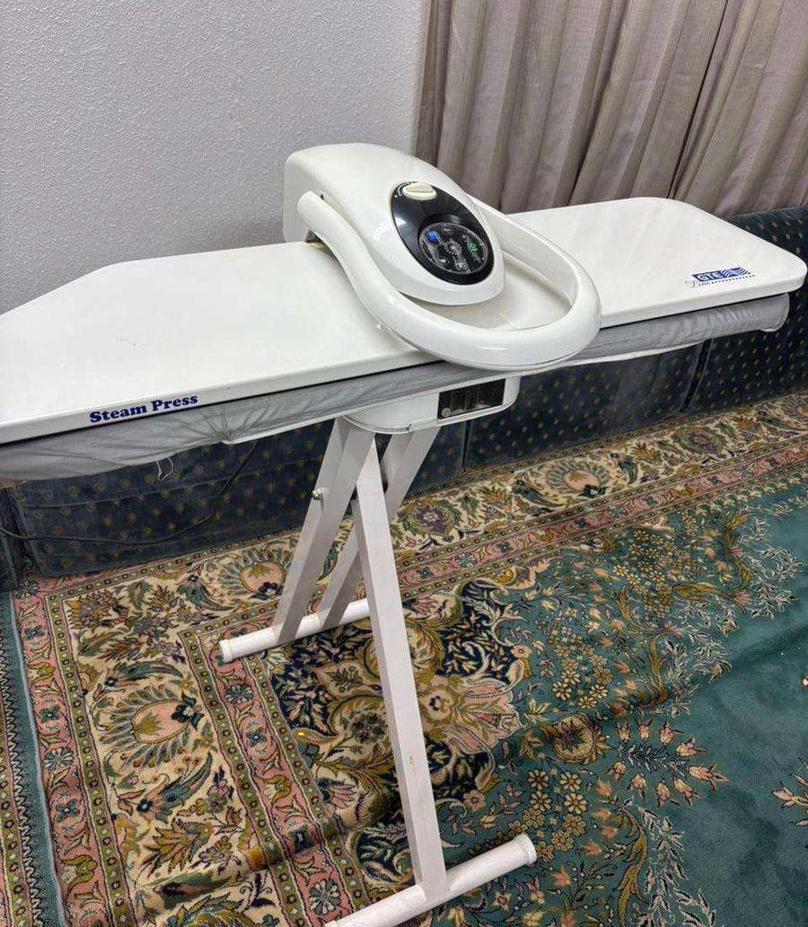 مكواة بخار كبس