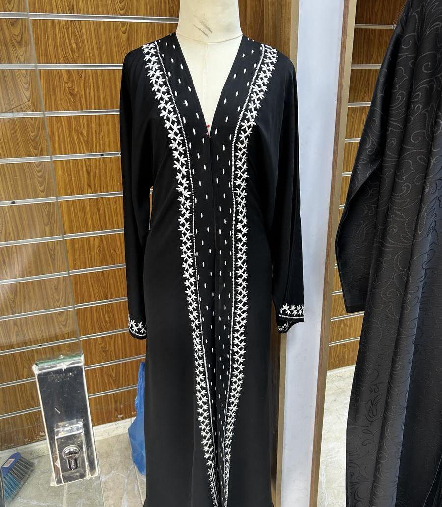خياط عبايات وفساتين