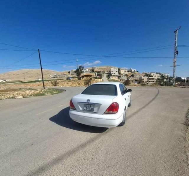 2004, نيسان, صني,